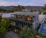 The rooftop terrace includes a tucked away cedar soaking tub and an outdoor shower with views of the Santa Ynez mountains.