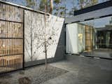 Solar Panels Completely Cover One Side of This 98-Foot-Long Brutalist Home in Tasmania - Photo 7 of 19 -