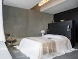 Solar Panels Completely Cover One Side of This 98-Foot-Long Brutalist Home in Tasmania - Photo 14 of 19 -