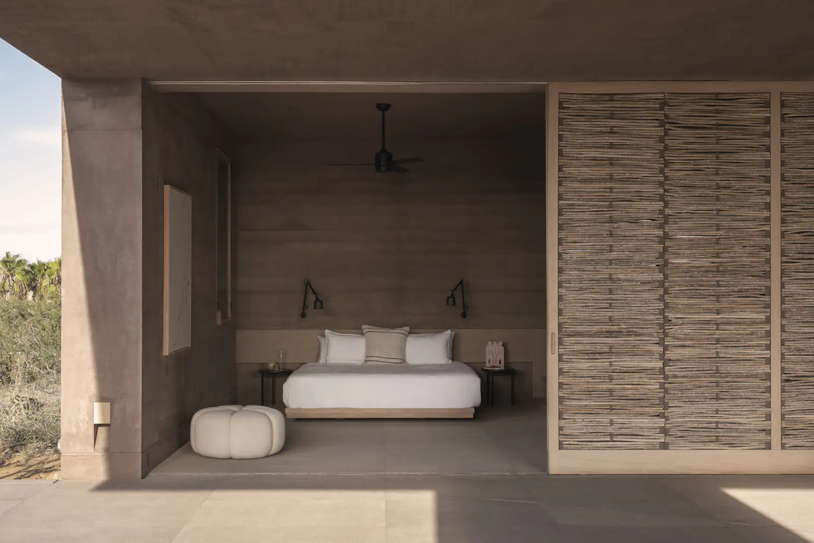 Photo 10 of 15 in A Dusty-Pink Rammed Earth Home Appears to Rise Out of ...