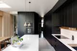 On the ground level, the open-concept kitchen and dining area were also transformed in the renovation. 