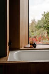 The bathtub is made by Bette.