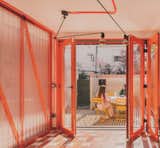 A Framework of Orange and Green Steel Reorganizes a Madrid Home for a Family of Four - Photo 15 of 15 - 
