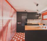 A Framework of Orange and Green Steel Reorganizes a Madrid Home for a Family of Four - Photo 4 of 15 - 