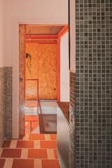 A Framework of Orange and Green Steel Reorganizes a Madrid Home for a Family of Four - Photo 9 of 15 - 