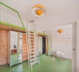 A Framework of Orange and Green Steel Reorganizes a Madrid Home for a Family of Four - Photo 12 of 15 - 