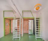 A Framework of Orange and Green Steel Reorganizes a Madrid Home for a Family of Four - Photo 13 of 15 - 