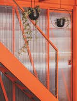 A Framework of Orange and Green Steel Reorganizes a Madrid Home for a Family of Four - Photo 6 of 15 - 