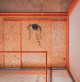 A Framework of Orange and Green Steel Reorganizes a Madrid Home for a Family of Four - Photo 8 of 15 - 