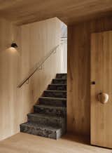 A Remote Island Retreat’s Hefty Wooden Doorknob Hints at Its Highly Custom Interiors - Photo 5 of 21 - 