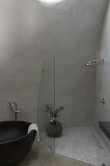 One of the two bathrooms contains a shower and a soaking tub.