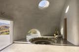 The conversation pit was another idea central to Dudik’s early dream. It’s complemented by a semi-circle window and a skylight for views of the mountains and the stars.