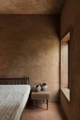 A Wave of Concrete Ribbons Forms a Courtyard at This Home in India - Photo 11 of 12 - 