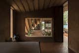 A Wave of Concrete Ribbons Forms a Courtyard at This Home in India - Photo 7 of 12 - 