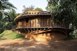Around 6,200 Toys Make Up a Veranda Wrapping This Home in India