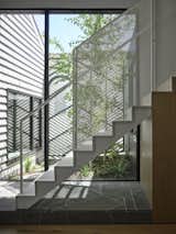 Batten Screens Wrapping This Renovation in Australia Are Bold. The Interiors Are Even Bolder - Photo 10 of 19 - 