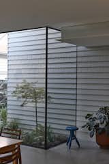 Batten Screens Wrapping This Renovation in Australia Are Bold. The Interiors Are Even Bolder - Photo 15 of 19 - 