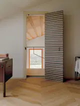 Terra-Cotta Creates a Surprising Terrazzo Floor at This Renovated Italian Barn - Photo 11 of 17 - 