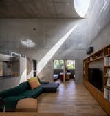 Half-Moon Cutouts Cast Dramatic Light Across This Concrete Home in Tokyo - Photo 5 of 16 - 