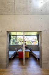 Half-Moon Cutouts Cast Dramatic Light Across This Concrete Home in Tokyo - Photo 8 of 16 - 