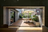 Half-Moon Cutouts Cast Dramatic Light Across This Concrete Home in Tokyo - Photo 11 of 16 - 