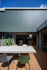 Half-Moon Cutouts Cast Dramatic Light Across This Concrete Home in Tokyo - Photo 12 of 16 - 