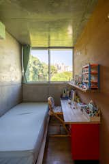 Half-Moon Cutouts Cast Dramatic Light Across This Concrete Home in Tokyo - Photo 9 of 16 - 