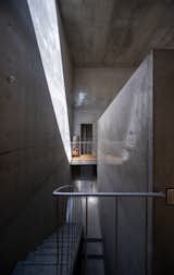Half-Moon Cutouts Cast Dramatic Light Across This Concrete Home in Tokyo - Photo 14 of 16 - 