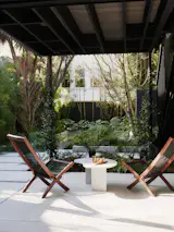 The existing shack felt dark and experientially disconnected from the remaining house, and although the backyard hadn’t been cared for in years, the new owners loved that the house had potential for an idyllic outdoor space.