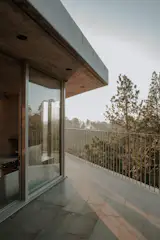 Stacked Geometric Shapes Form a Hillside Concrete Home in Colombia - Photo 8 of 13 - 