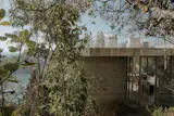 Stacked Geometric Shapes Form a Hillside Concrete Home in Colombia - Photo 5 of 13 - 
