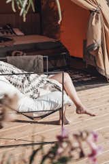 The Softshell is built on a wooden platform that doubles as a sun deck for lounging.