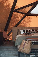 A lofted mezzanine can be used as an unconventional take on a traditional hammock.