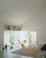 Red Piping Punches Up a Liechtenstein Home Split Into Two Units - Photo 6 of 11 - 