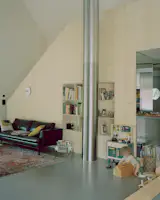 Red Piping Punches Up a Liechtenstein Home Split Into Two Units - Photo 5 of 11 - 