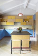 The custom woodwork, including the new kitchen cabinet's, cost $128K.