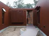 Burnt-Orange Corrugated Steel Clads This Australian Saltbox House - Photo 9 of 17 - 