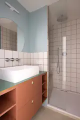 Curves and Bauhaus-Inspired Colors Freshen Up a 560-Square-Foot Barcelona Apartment - Photo 9 of 11 - 