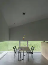 A Ribbon of Windows Wraps This Concrete Cabin in Switzerland - Photo 6 of 13 -