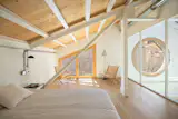 The loft’s two bedrooms are located on the third floor.&nbsp;