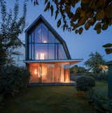 You’d Never Believe This Angular Glass Facade Stands Among Former Military Barracks