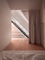 You’d Never Believe This Angular Glass Facade Stands Among Former Military Barracks