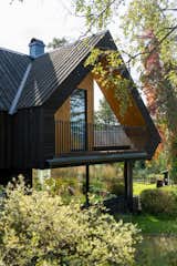 The Roof at This Norwegian Retreat Holds a Surprisingly Roomy Second Level