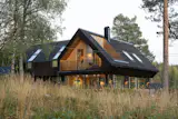 The Roof at This Norwegian Retreat Holds a Surprisingly Roomy Second Level