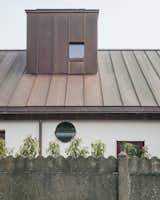 Timber Structures Pull Triple Duty Inside This Belgian Home for a Retired Couple