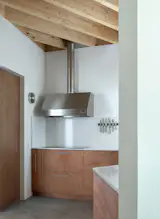 Wood Prefab Panels Cloaked in Galvanized Steel Form a Hillside Home in Barcelona - Photo 8 of 14 - 