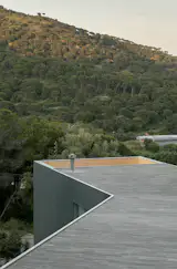 Wood Prefab Panels Cloaked in Galvanized Steel Form a Hillside Home in Barcelona - Photo 14 of 14 - 
