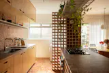 Beautifully Chaotic Caquinhos Tile Grounds This Small Apartment Renovation in Brazil - Photo 5 of 10 -