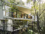 This 5,382-Square-Foot Home in Brazil Weaves Through the Forest on a Network of Piles - Photo 5 of 11 - 
