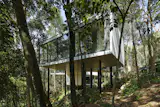 This 5,382-Square-Foot Home in Brazil Weaves Through the Forest on a Network of Piles - Photo 6 of 11 - 
